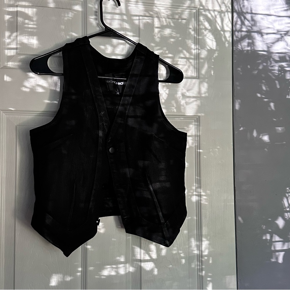- [ ] Black Stretchy Denim Button Up Vest